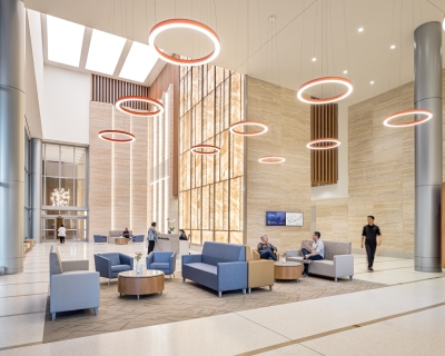 Lobby with floor to ceiling windows and a skylight to provide ample natural light.